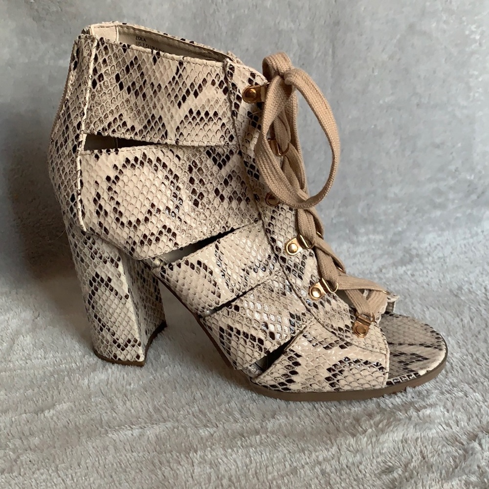 Lace up snakeskin heels